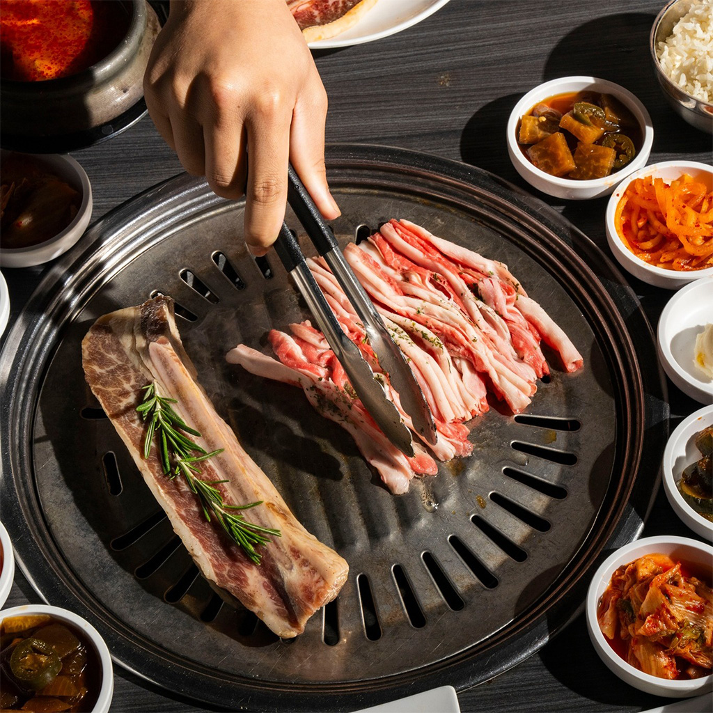 Dickson Bros. site in Harvard Square is proposed to be four stories of Korean barbecue, including a deck
